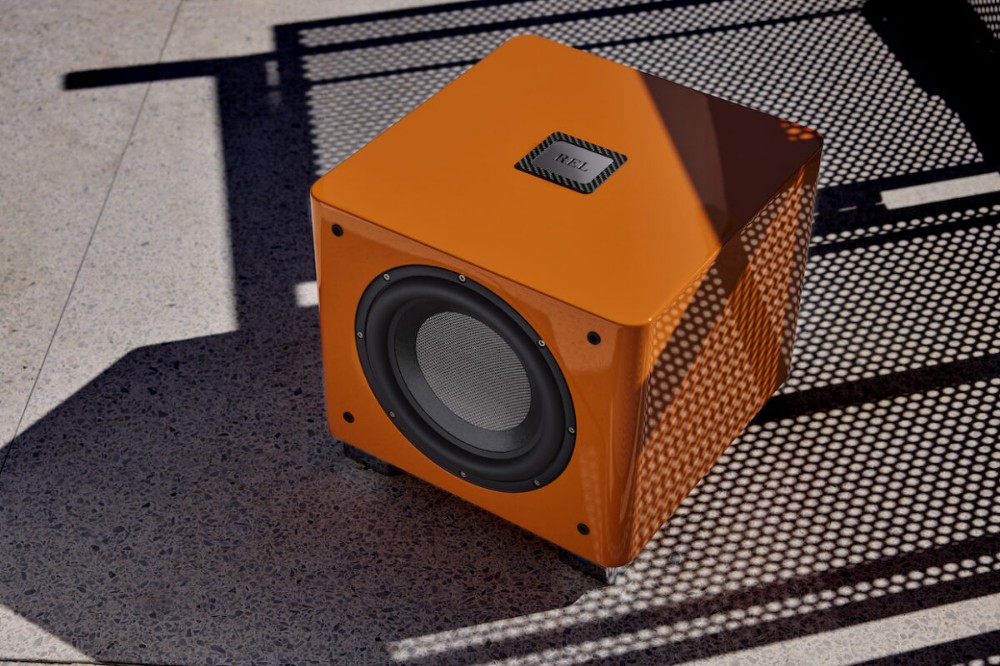 REL T/9x SE Subwoofer Orange on Patio